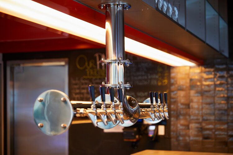 A suspended draft beer dispensing system