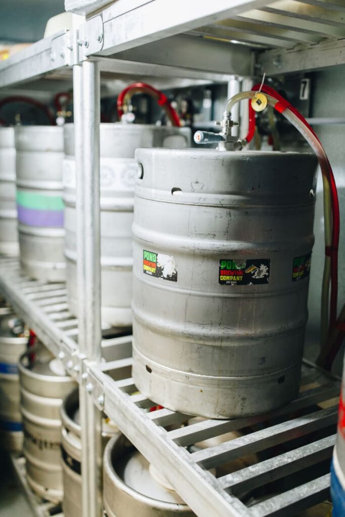 Draft system lines connected to keg in back room of bar