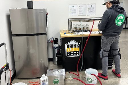 Northwest Draft Technicians team member cleaning draft lines